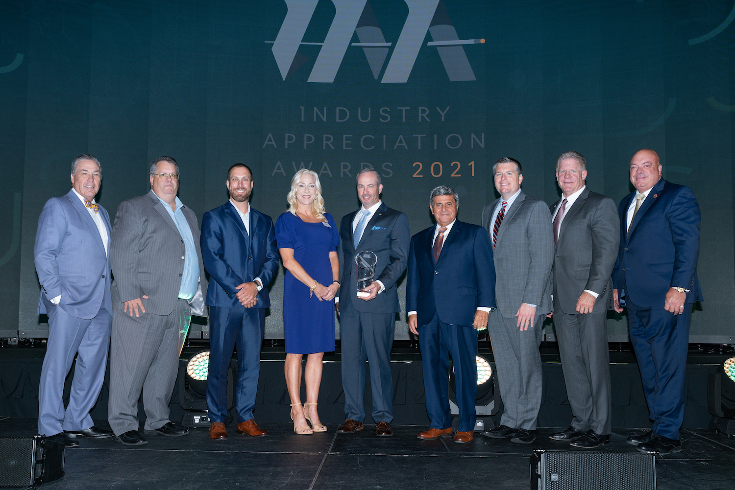 John Wright Kyle DeCicco and Amy McQuagge accept the 2021 Industry Appreciation Business Resiliency and Innovation Award